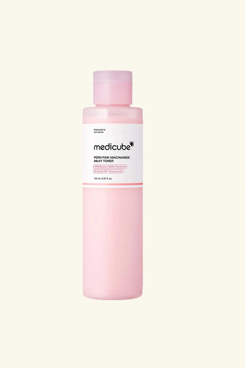 Pink bottle with white label on a light pink background