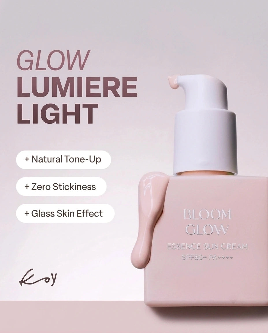 Bloom Glow Essence Sun Cream SPF 50+ in a pale pink rectangular bottle with a white pump dispenser, shown on a soft pink background with promotional text reading 'GLOW LUMIÈRE LIGHT' and feature callouts.