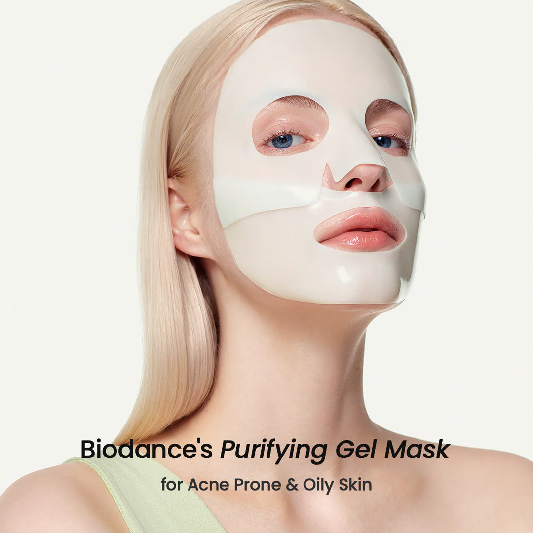 Woman wearing a Biodance Purifying Gel Mask on a plain background