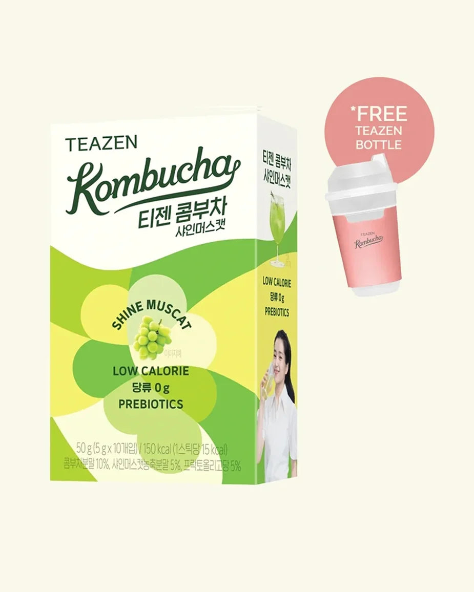A box of TEAZEN Kombucha Shine Muscat low calorie prebiotics, shown on a solid cream background with a pink 'FREE TEAZEN BOTTLE' promotional badge in the top right corner.