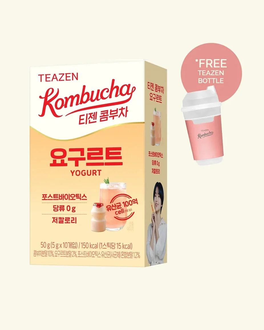 A box of TEAZEN Kombucha Yogurt on a light cream background, featuring red and black text, a pink promotional badge indicating a free plastic cup, and an illustration of a yogurt cup on the side panel.