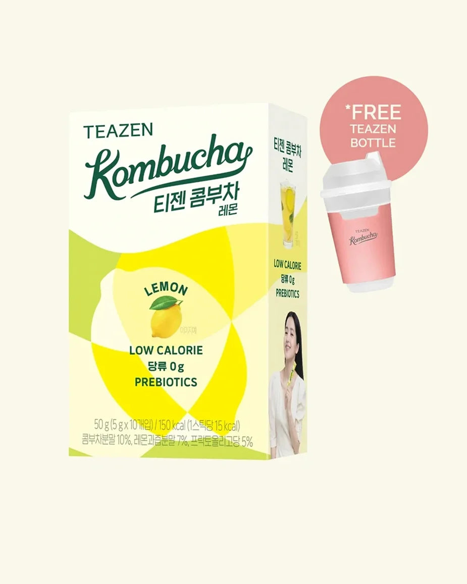 A box of Teazen Kombucha Lemon flavor, featuring a white and yellow design with green branding text. A small pink circular badge on the top right advertises a free lemon bottle.