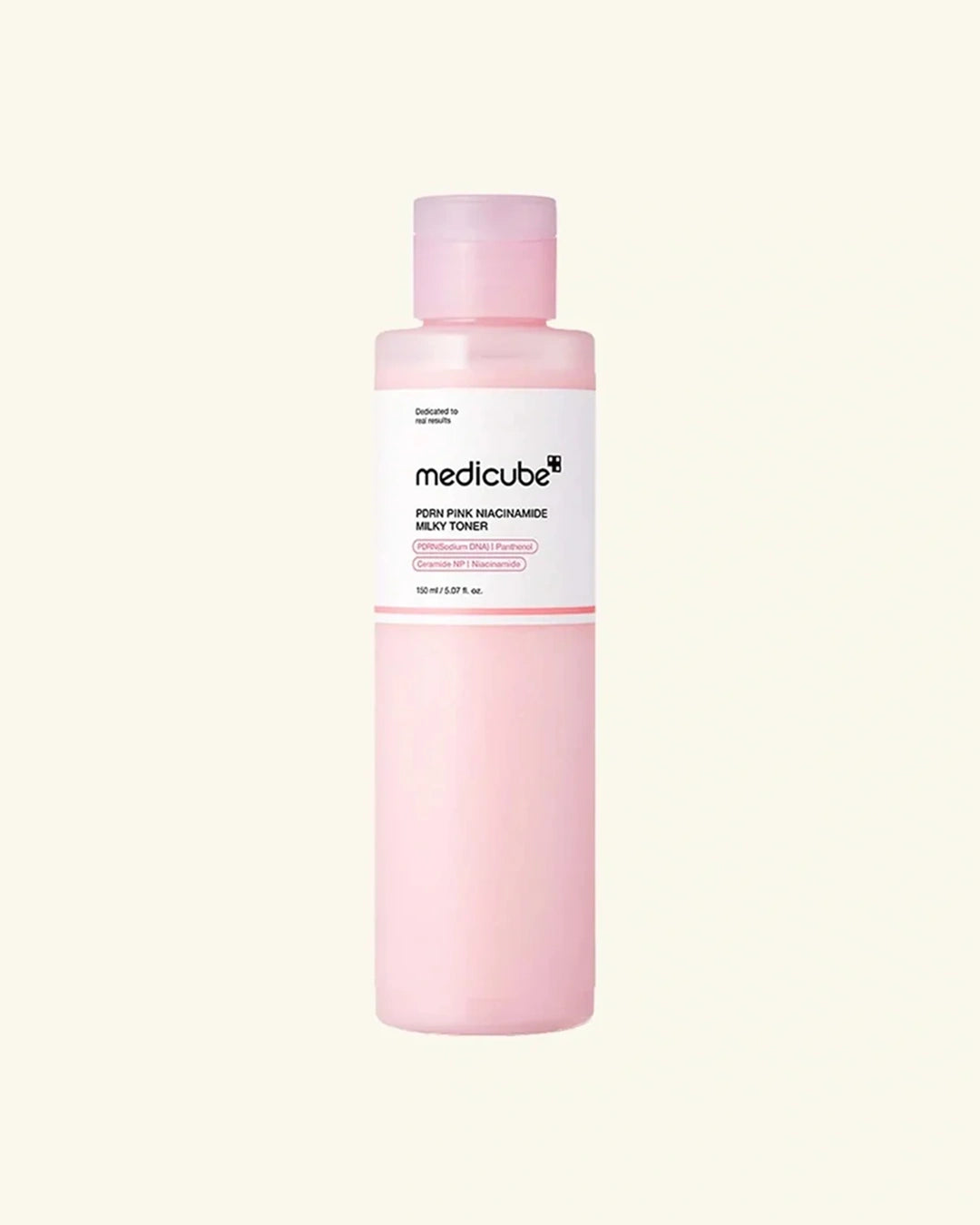 A bottle of medicube Hydra-Pure Rejuvenate Body Toner in a soft pink translucent bottle with a white label, centered on a light cream background.