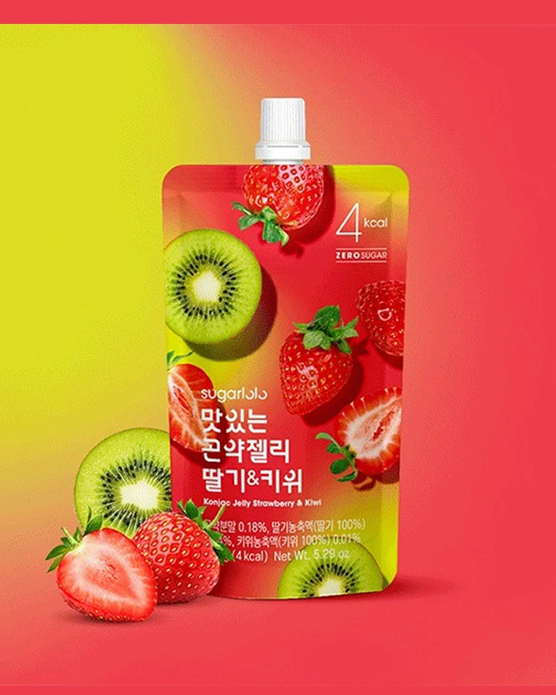 A stand-up pouch of sugar-free jelly strawberry and kiwi drink with a white cap, shown on a red-to-yellow gradient background with sliced strawberries and kiwi fruit arranged around it. The pouch has Korean text and a 4 kcal label.