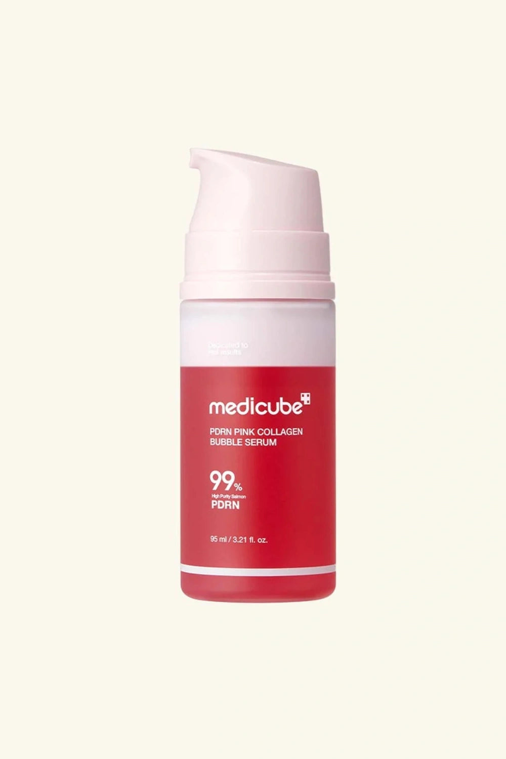 Medicube serum bottle with red label and pink cap on a white background
