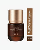Solid Volume Ampoule premium anti-aging skincare in a dark brown bottle with a metallic gold cap, shown next to a vertical brown label indicating 35 ml.