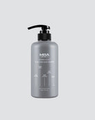 A gray pump bottle of MBA for All. DC Derma Scalp Black Turn Hair Shampoo, centered on a light gray background.