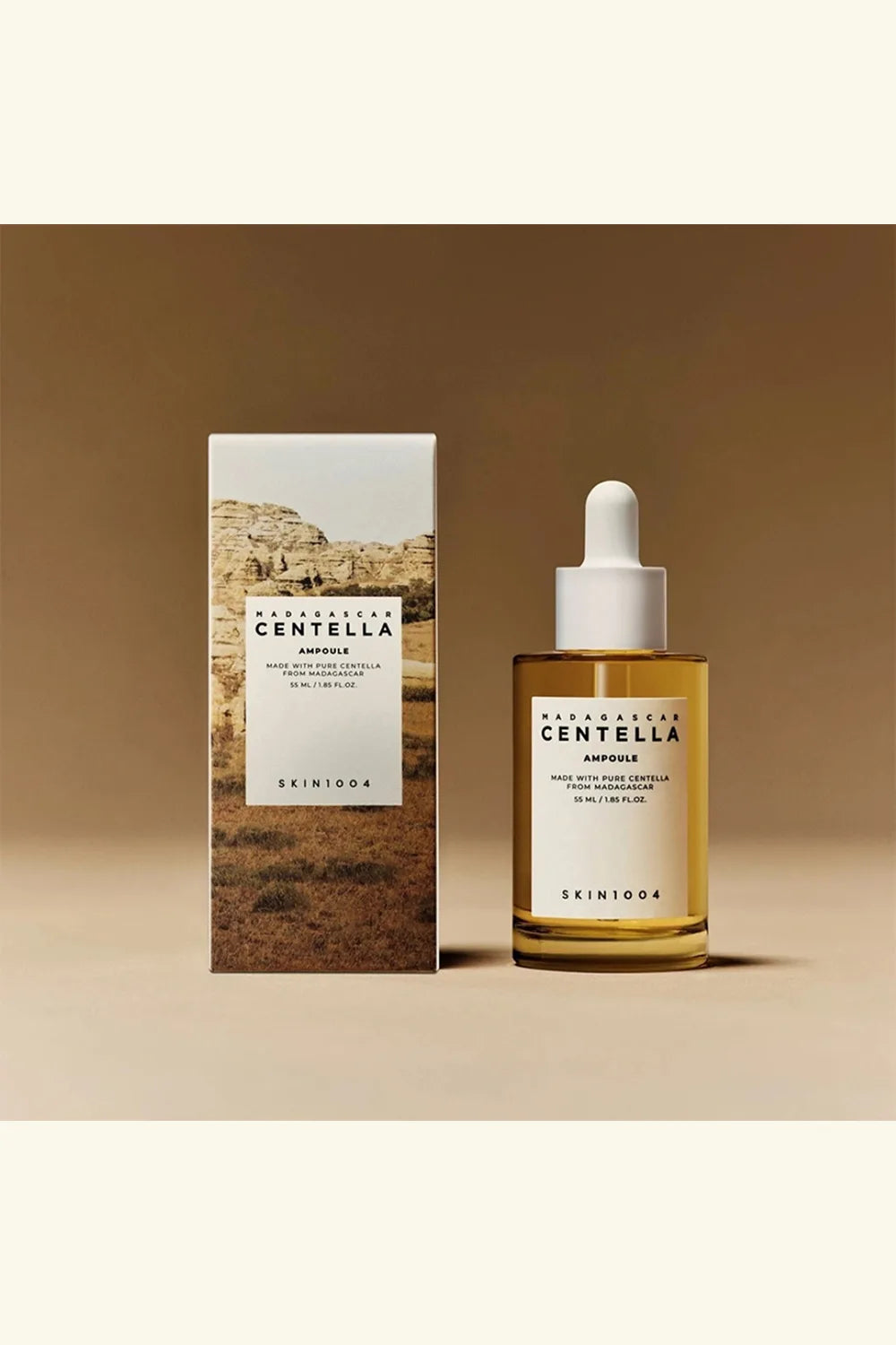 Skintopia Centella Ampoule bottle and box on a beige background