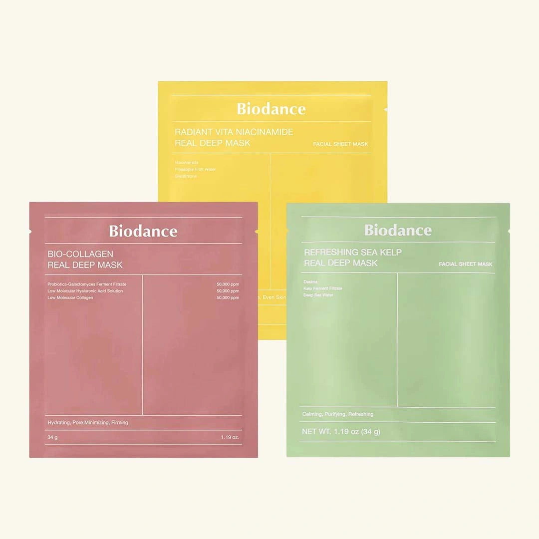 Three Biodance sheet masks in different colors on a white background