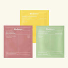 Three Biodance sheet masks in different colors on a white background