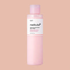 Pink bottle of Medicube product on a beige background