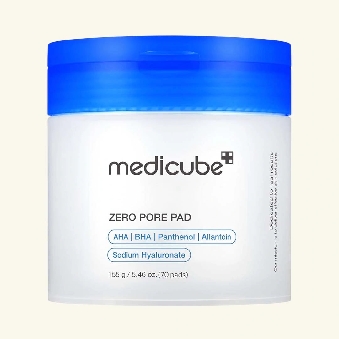 Medicube Zero Pore Pad container with blue lid on a light beige background