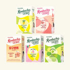 Collection of TEAZEN Kombucha boxes in various flavors on a white background