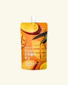 A 500ml squeeze pouch of sugarfina Mango Chilli drink, featuring a vibrant orange and yellow mango graphic with Korean text, set against a solid cream background.