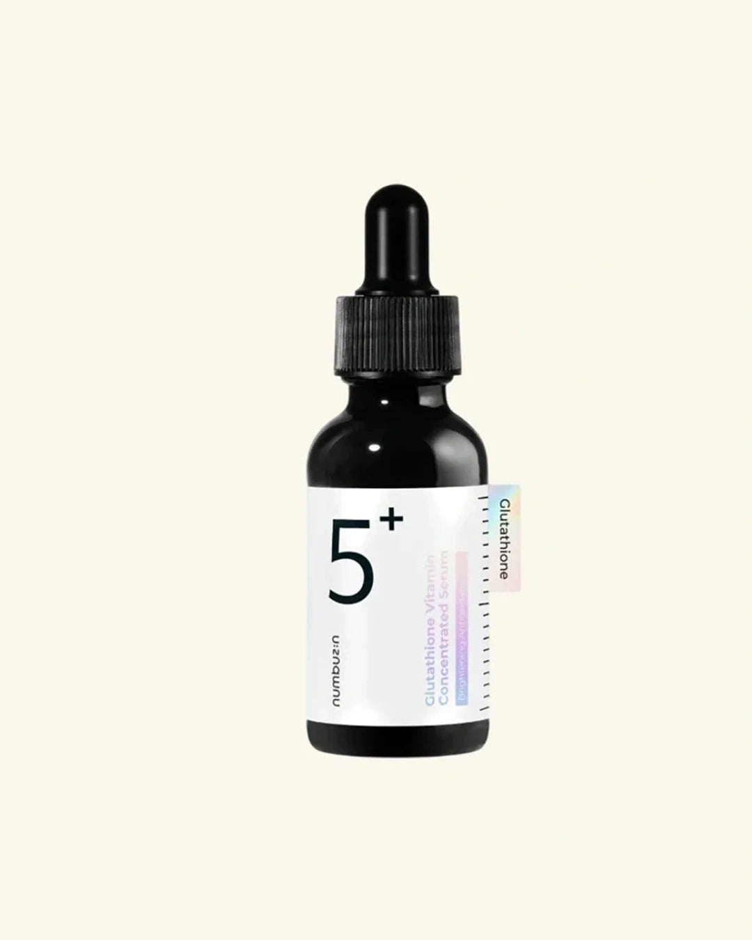 A small black dropper bottle with a white label reading '5+' and 'hairgrowth' on a plain warm off-white background.